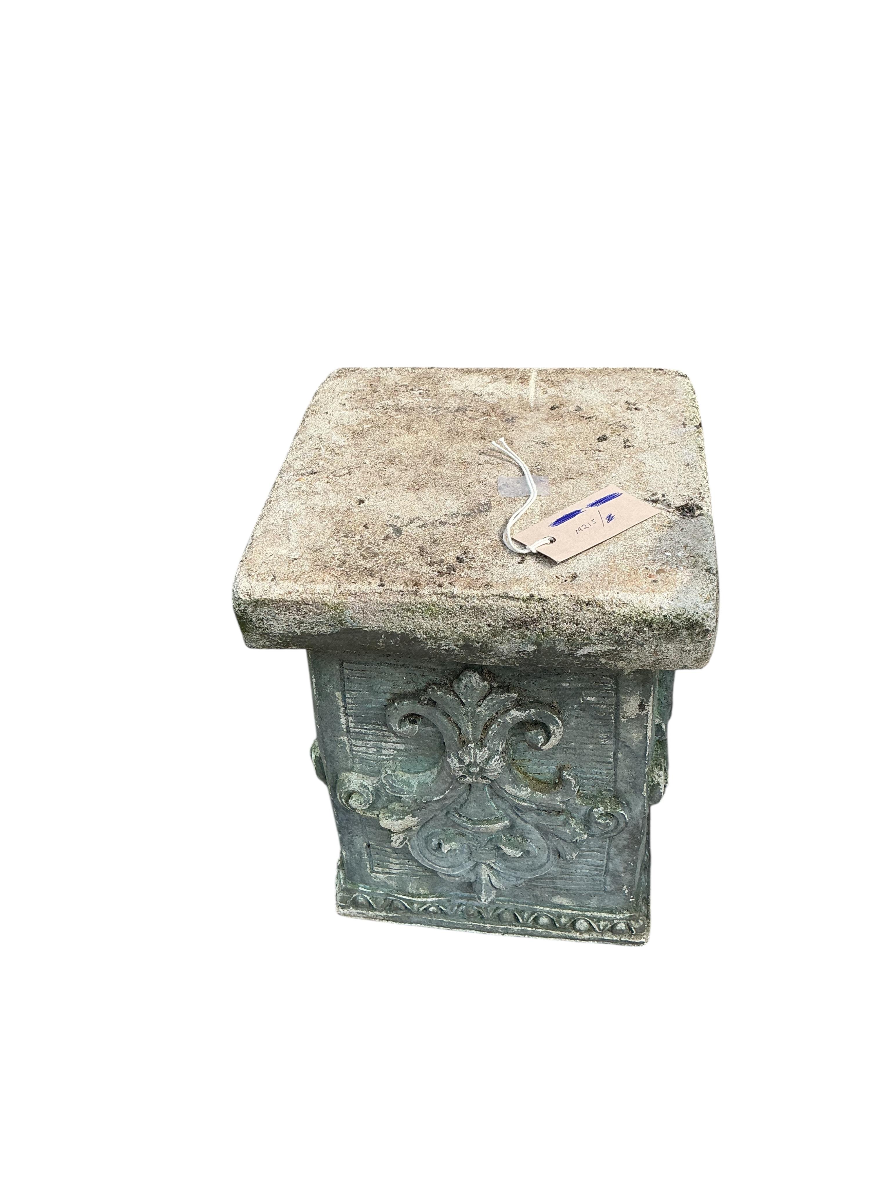 A painted stone garden bust of a female on associated square pedestal, combined height 80cm